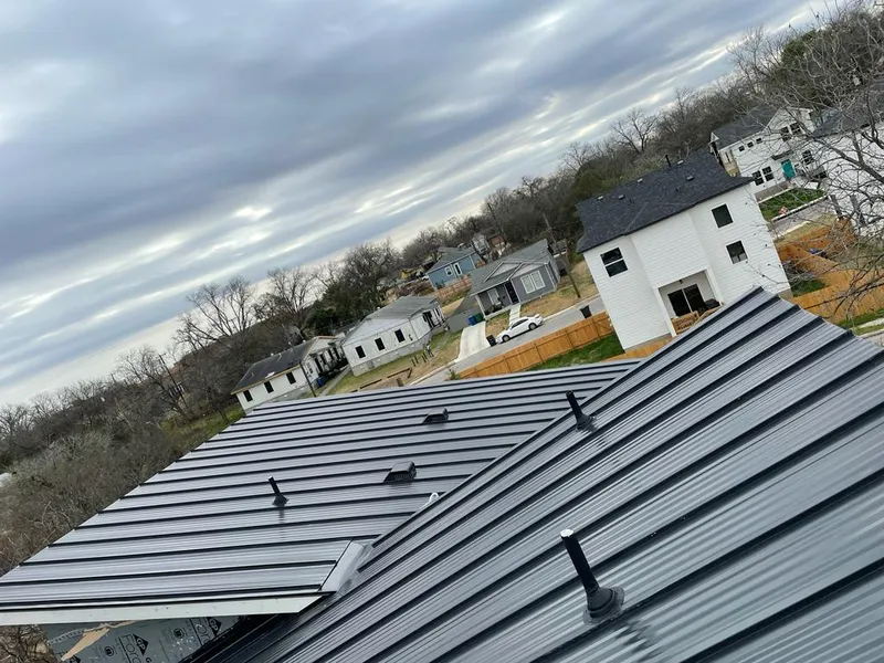 Standing seam metal roof panels with vents for Skylight Repair in North Hobbs